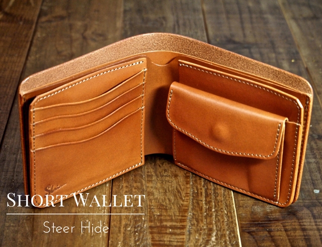 二つ折り財布〔皮革製〕 - 折り財布